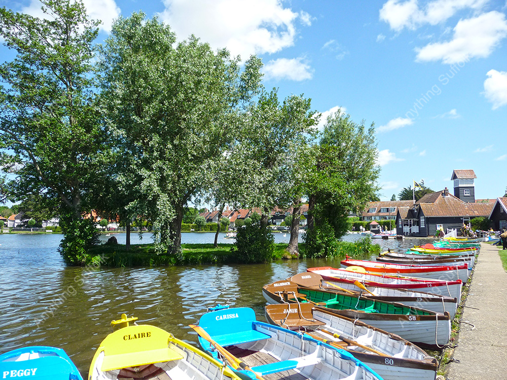 Boats at Thorpeness Mere by David Mayhew